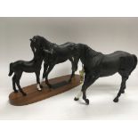 Two Beswick horses comprising a matt finish Black