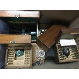 A collection of precision watch makers tools including Seiz, diamond microscopes etc