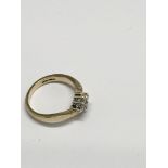 An 18ct gold and diamond set ring. Approx size K