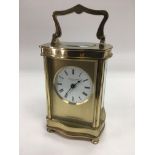 A brass cased carriage clock by J Horton & Son, Lo