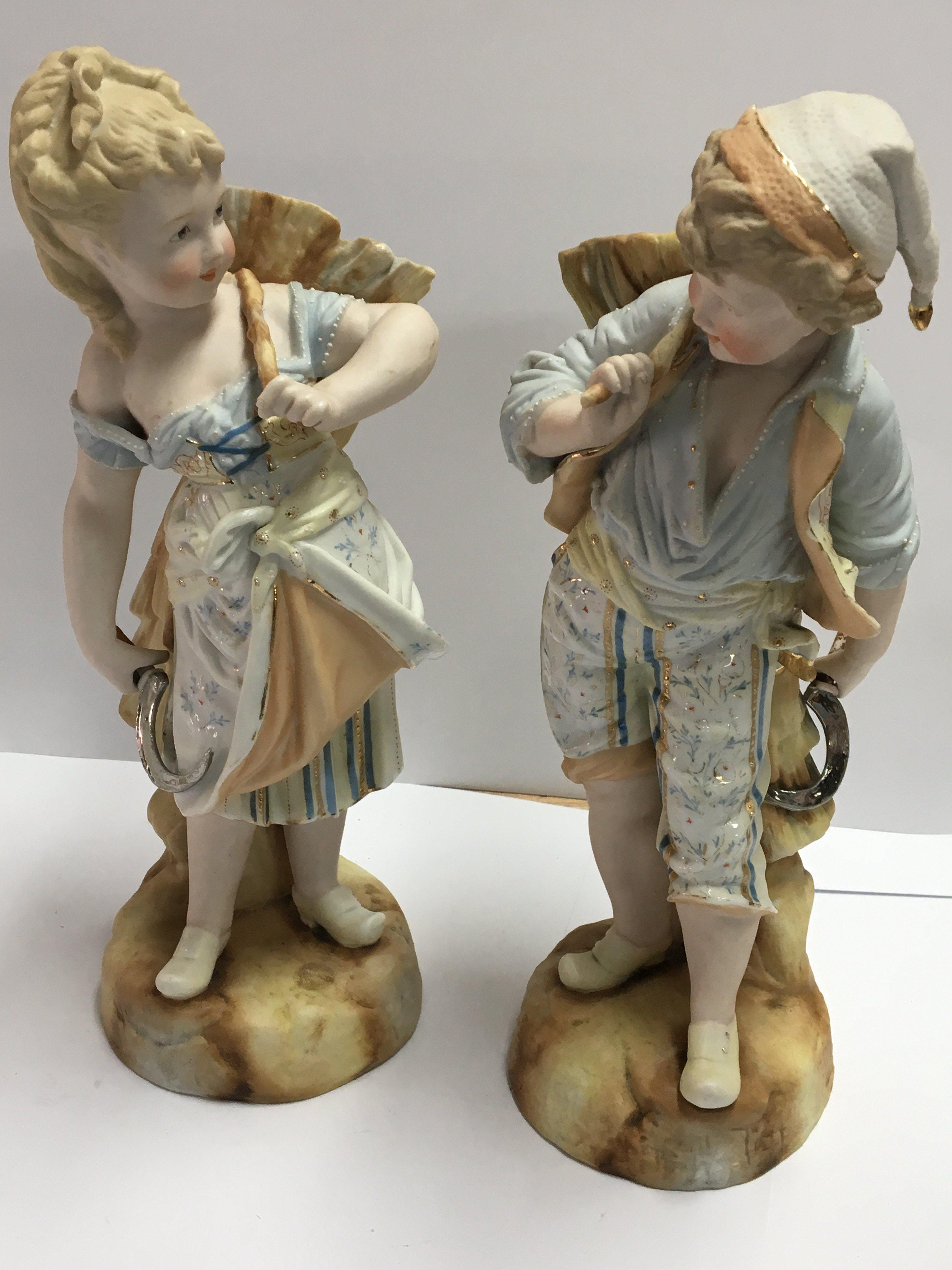 A pair of late 19th Century bisque figure vases, a - Image 2 of 2