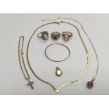 A collection of gold jewellery including a 9ct gol
