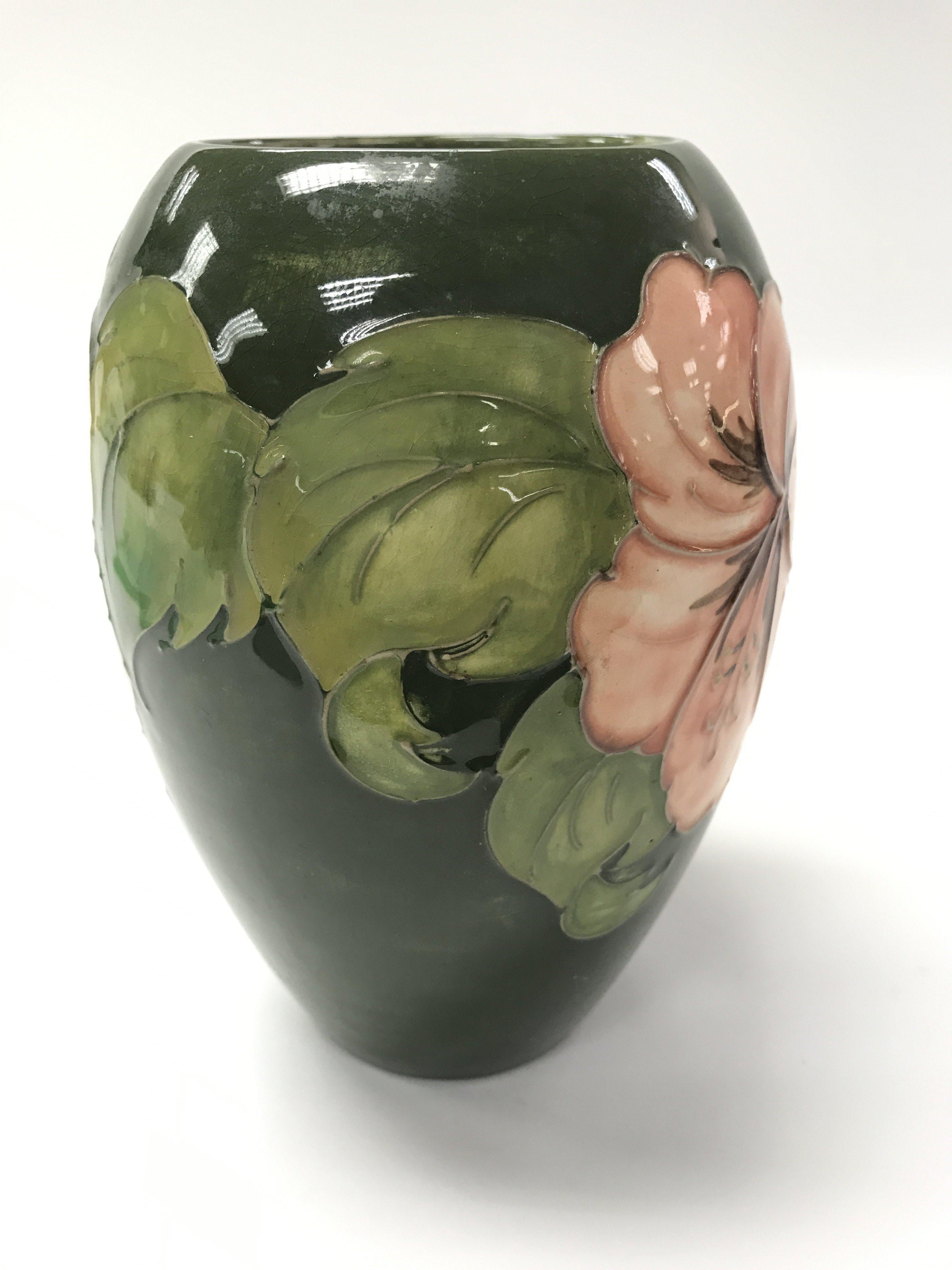 A floral pattern Moorcroft vase.