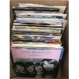 A collection of 7 inch singles by various artists