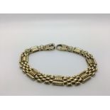 A 9ct gold link bracelet weighing approximately 15