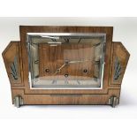 An Art Deco style walnut mantel clock.