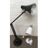 A black Anglepoise lamp and a retro style desklamp