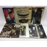 A collection of LPs by various artists including T