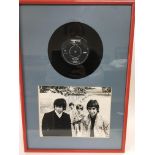 A framed and glazed signed black and white photo o