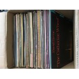 A box of approx fifty LPs and 12 inch singles by v