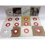 A collection of sixteen Bob Dylan 7 inch singles c