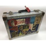 A road worn ex roadies travel case with various ap