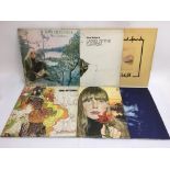 Six Joni Mtchell LPs comprising 'Court And Spark', 'Ladies Of The Canyon', 'Blue' and others.