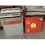 Two boxes of 12 inch singles comprising mainly dance and pop music.