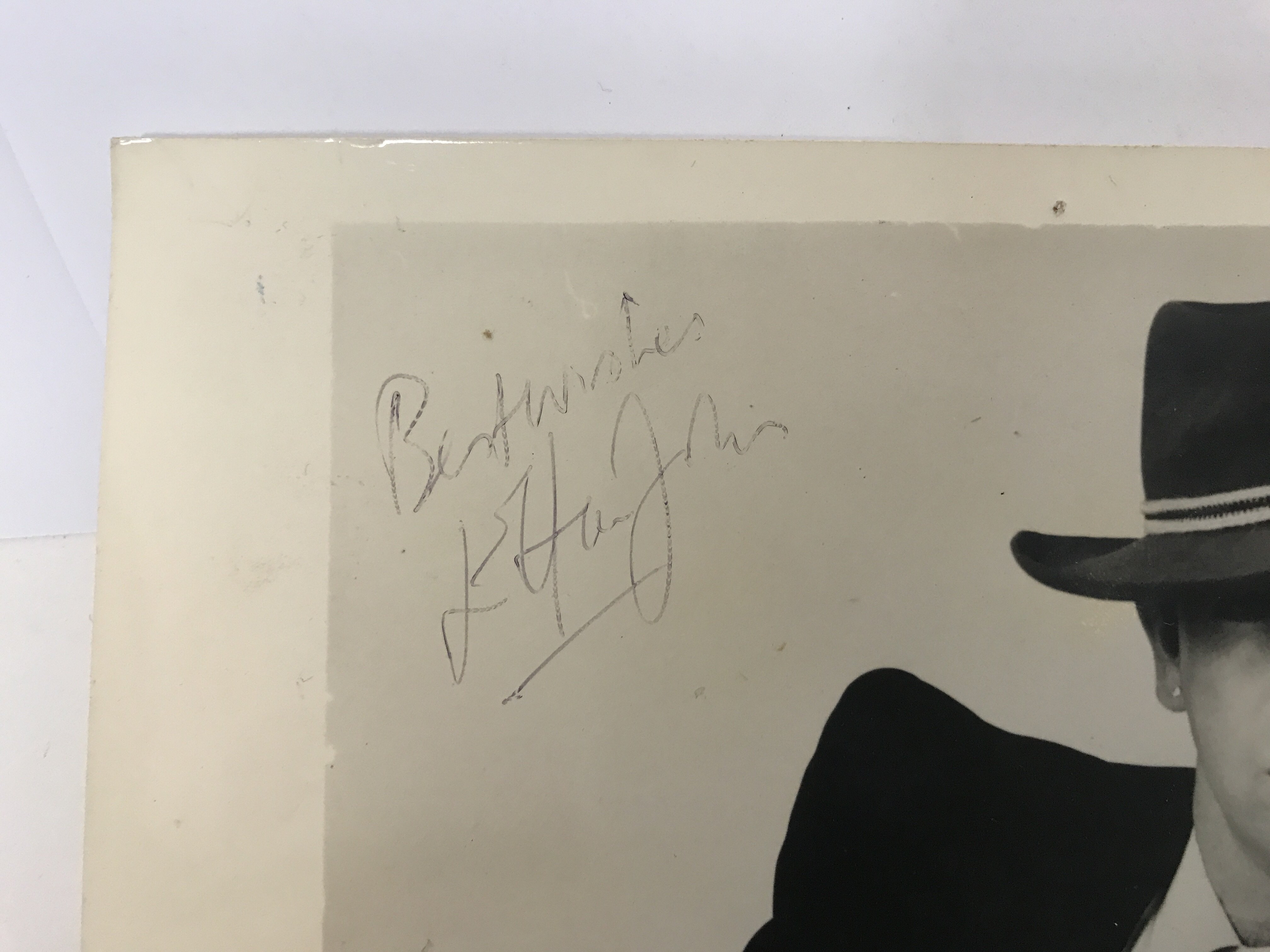 A signed 10"x8" black and white photograph of Elton John together with a book of 'Rock Album - Image 2 of 2