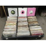 A large box of 7 inch singles by artists from the 1960s onwards.