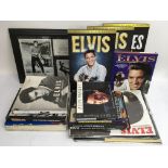 A collection of Elvis Presley memorabilia includin