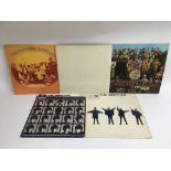 Five Beatles and related LPs comprising a numbered