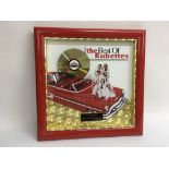 A framed and glazed presentation CD for over 100,0