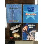 A collection of 'Status Quo' concert programmes fo