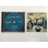 An Oasis signed CD of 'Definitely Maybe' bearing t