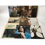 A collection of approx 50 country and folk LPs by