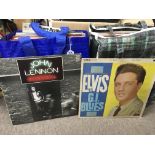 Two bags of LPs by various artists inlcuding Elvis Presley, Beach Boys, John Lennon and others.