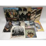 A collection of Beatles and related LPs including