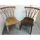 Two lightwood Ercol candlestick dining chairs for