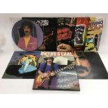 A collection of Frank Zappa and related LPs and 12