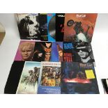 A collection of 12 & 7 inch vinyl singles and reco