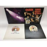 Four Queen LPs comprising 'Queen', 'A Day At The R