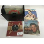 A record box of eighty plus Elvis Presley 7 inch s