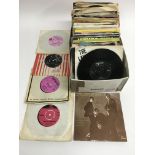 A collection of 7 inch singles and EPs by various