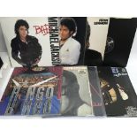 Two record boxes of various 7 inch singles and som