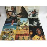 Twelve folk rock LPs by various artists including