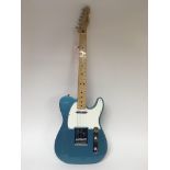 A Mexican Fender Telecaster in blue, new and unuse