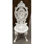 A cast iron Coalbrook style chair with figural rel