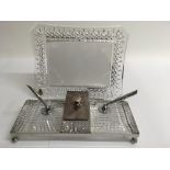 A Waterford crystal photo frame and a similar desk