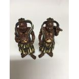 A pair of Japanese Meiji ivory stained well detail