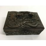 A Japanese type bronzed ring box decorated in reli