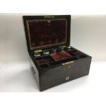 A Victorian travelling box with a fitted interior