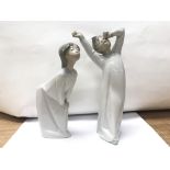 A pair of Lladro figures of bed time.