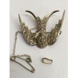 A fine Edwardian bird brooch set with diamonds and