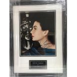 A framed and glazed photograph of Jean Simmons wit