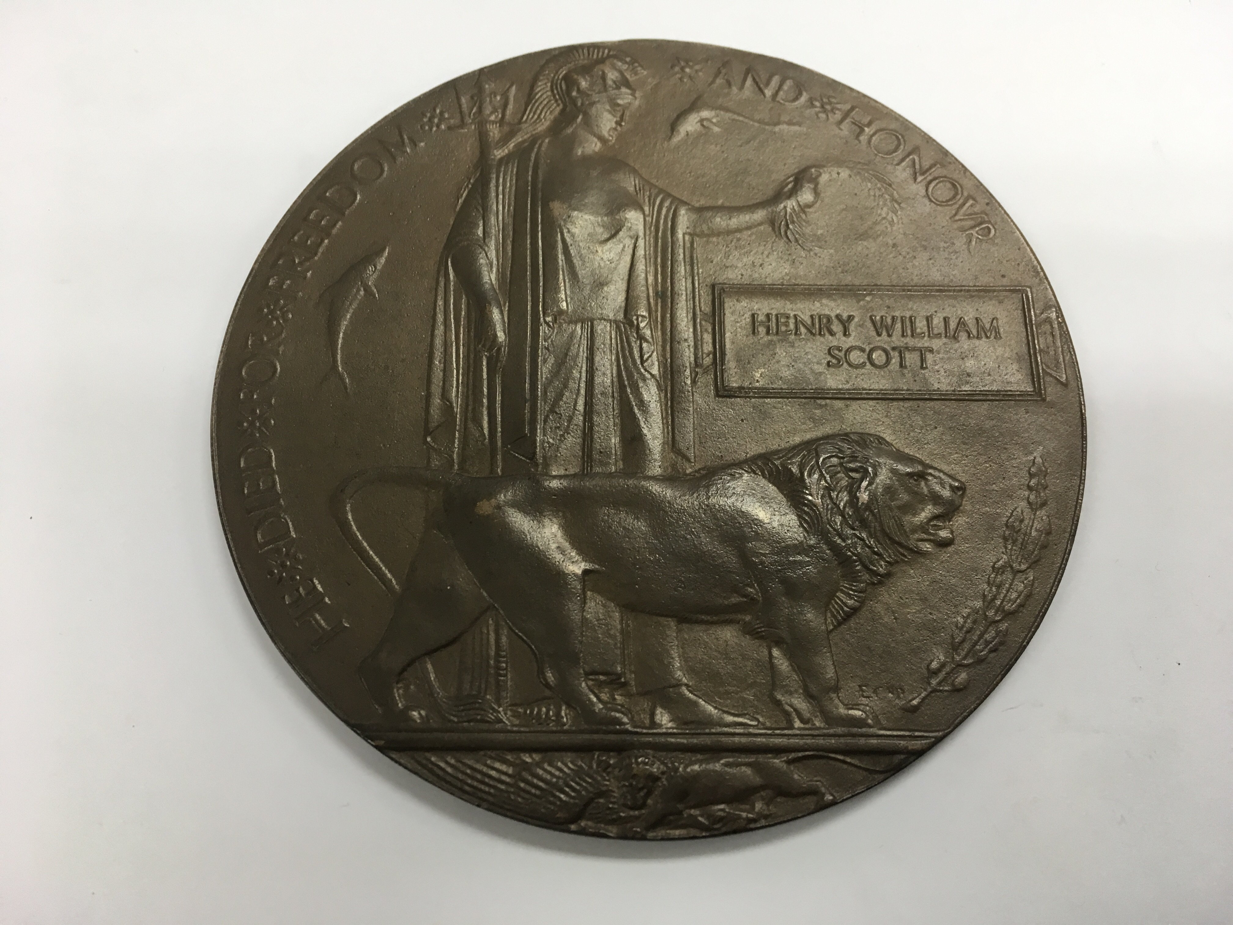 A WW1 death plaque with three possibilities as to