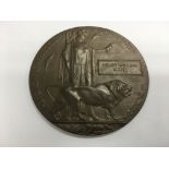 A WW1 death plaque with three possibilities as to