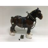 A Beswick shire horse, approx 22cm.
