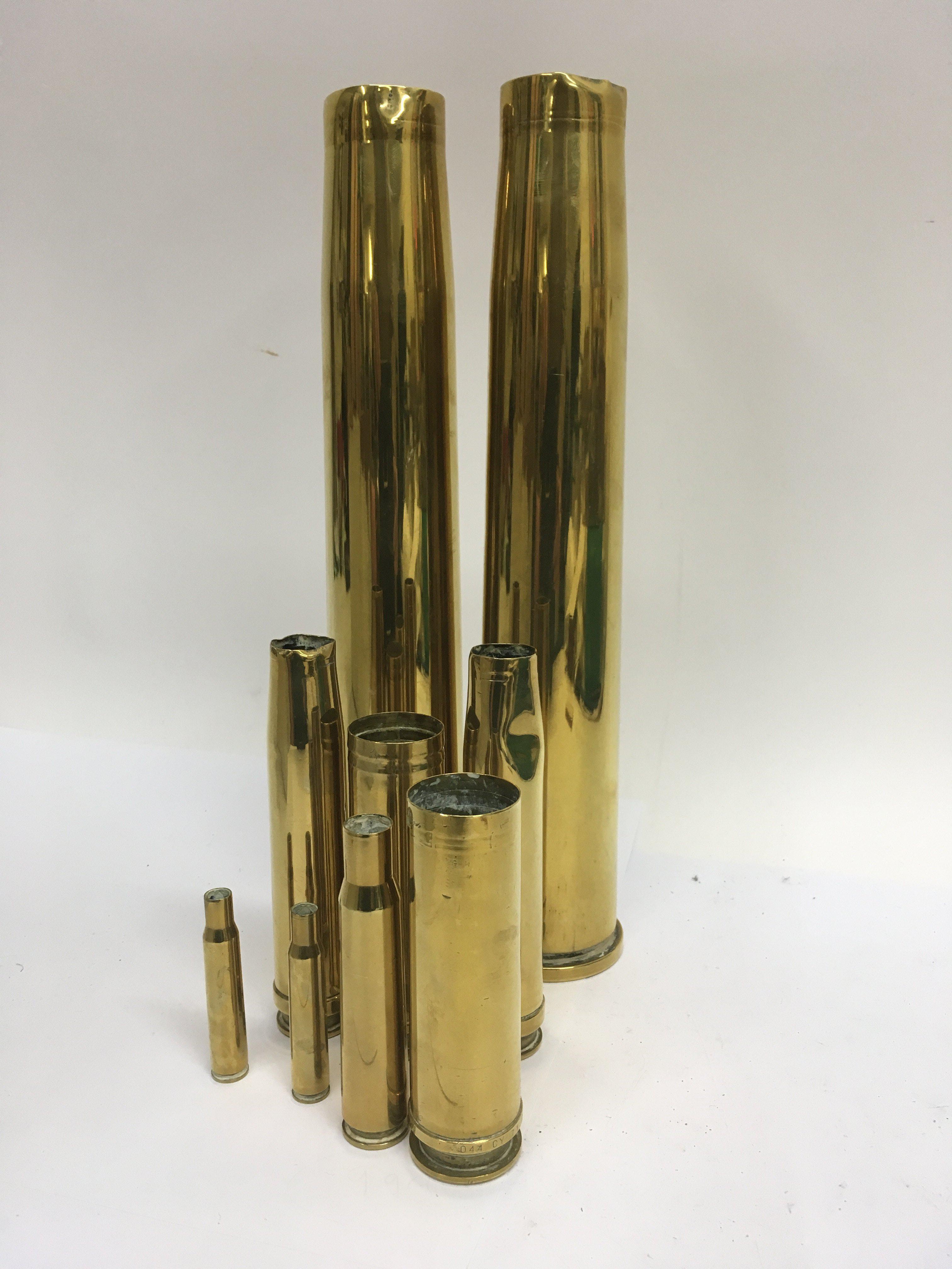 A collection of brass shell cases