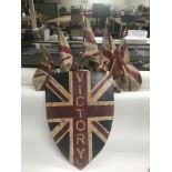 A Second World War 'Victory' shield with flags. Si